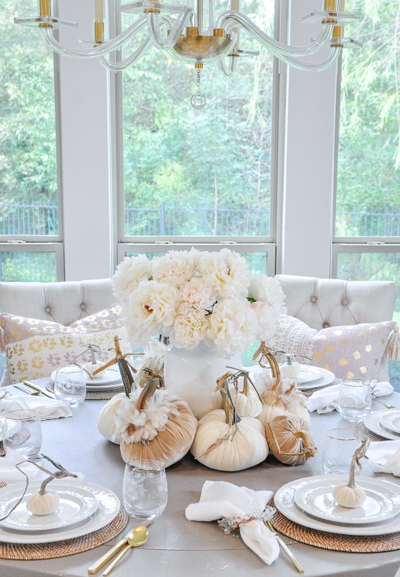Decorative pumpkins grouped stacked fall centerpiece 