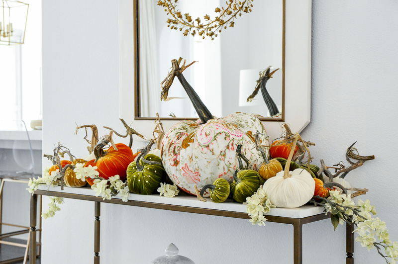 Decorative pumpkins in traditional fall orange colored velvet