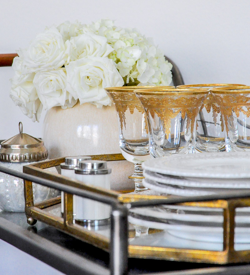 Elegant dining room bar cart styling gold glassware