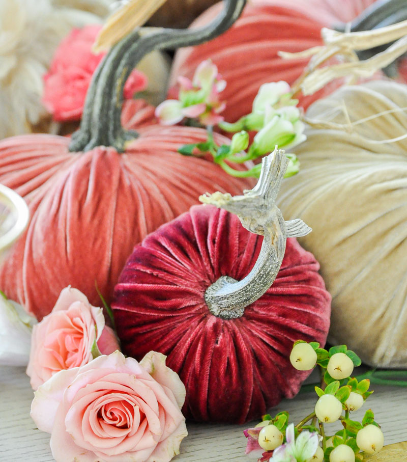 Thanksgiving centerpiece cascading pumpkins colors pinks reds