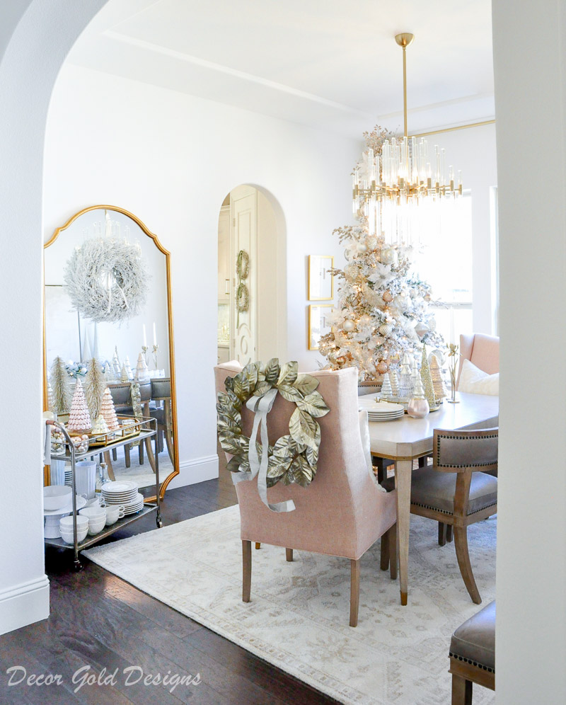 Christmas home tour dining room blush chairs gorgeous gold chair back wreath