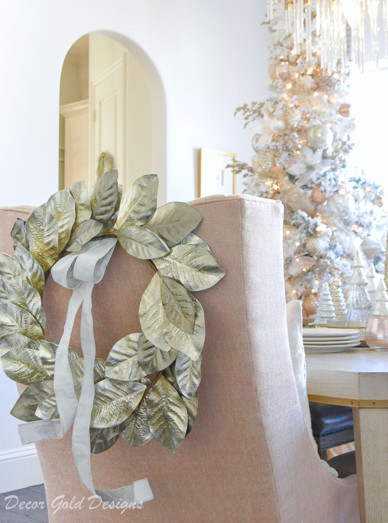 Christmas home tour dining room blush chairs gorgeous gold chair back wreath