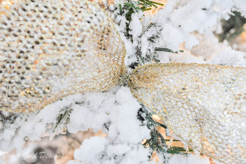 Christmas tree decorating steps include ribbon