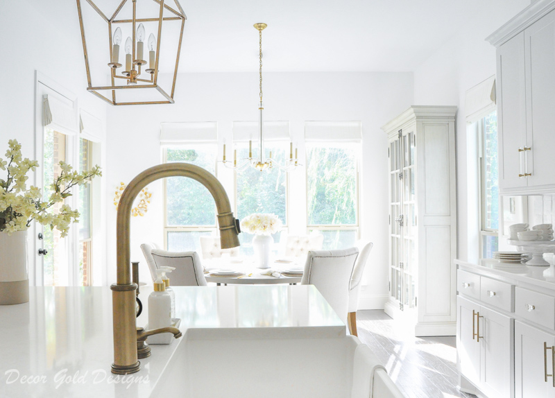 clean white kitchen countertop sink beautiful brass faucet