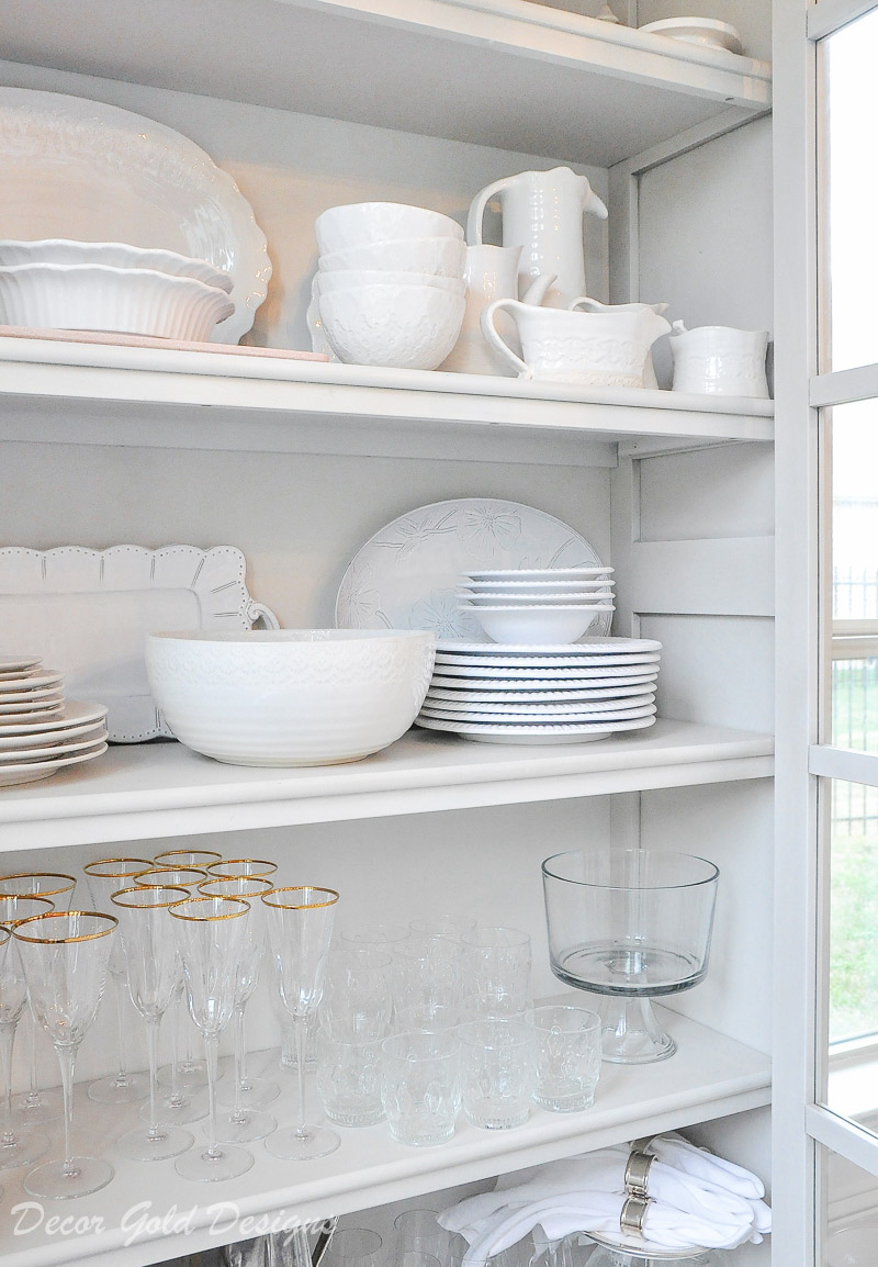 dish storage cabinet white dinnerware clear glassware