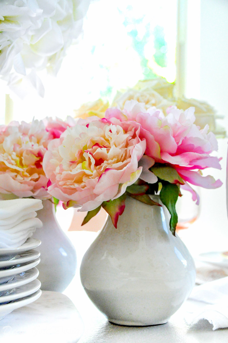 Beautiful faux flowers pink peonies white vase