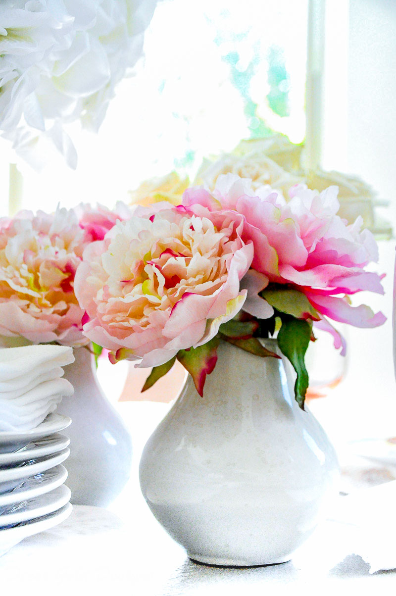 Beautiful faux flowers pink peonies white vase