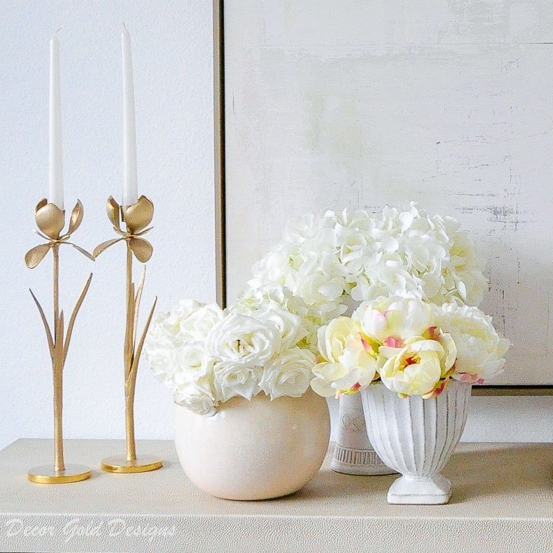 Faux flowers white vases grouping