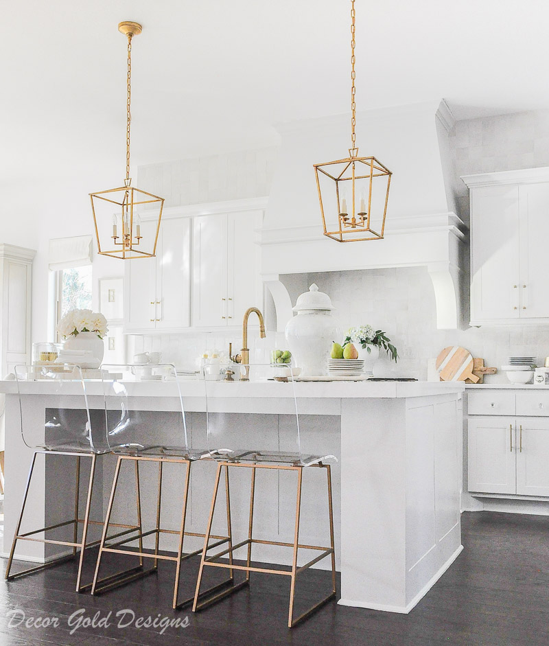 kitchen countertop styling ideas white brass gold accents lucite stools