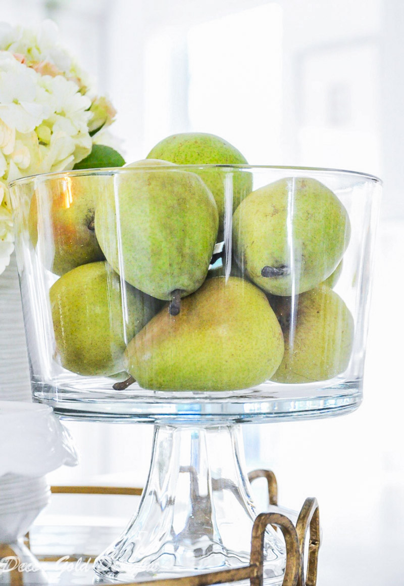 Beautiful kitchen countertop styling ideas. Vignette glass pedestal bowl pears.