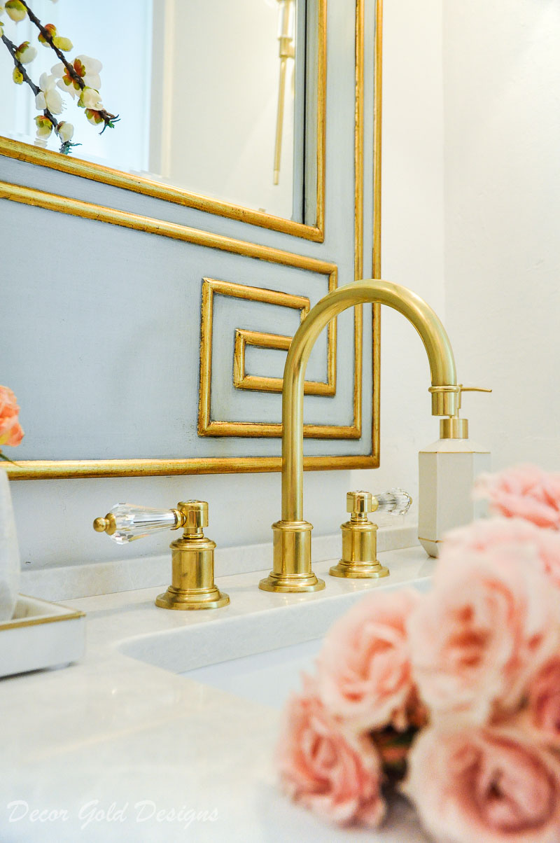 Gorgeous powder bathroom mirror faucet details