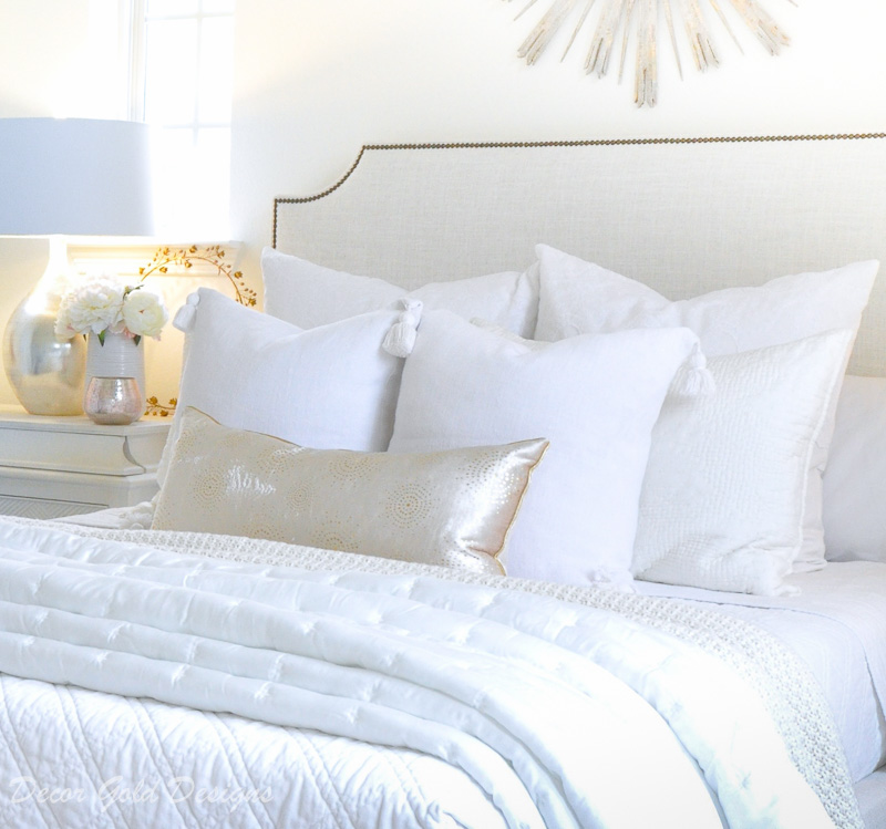 Beautiful designer bedroom white layered bedding 