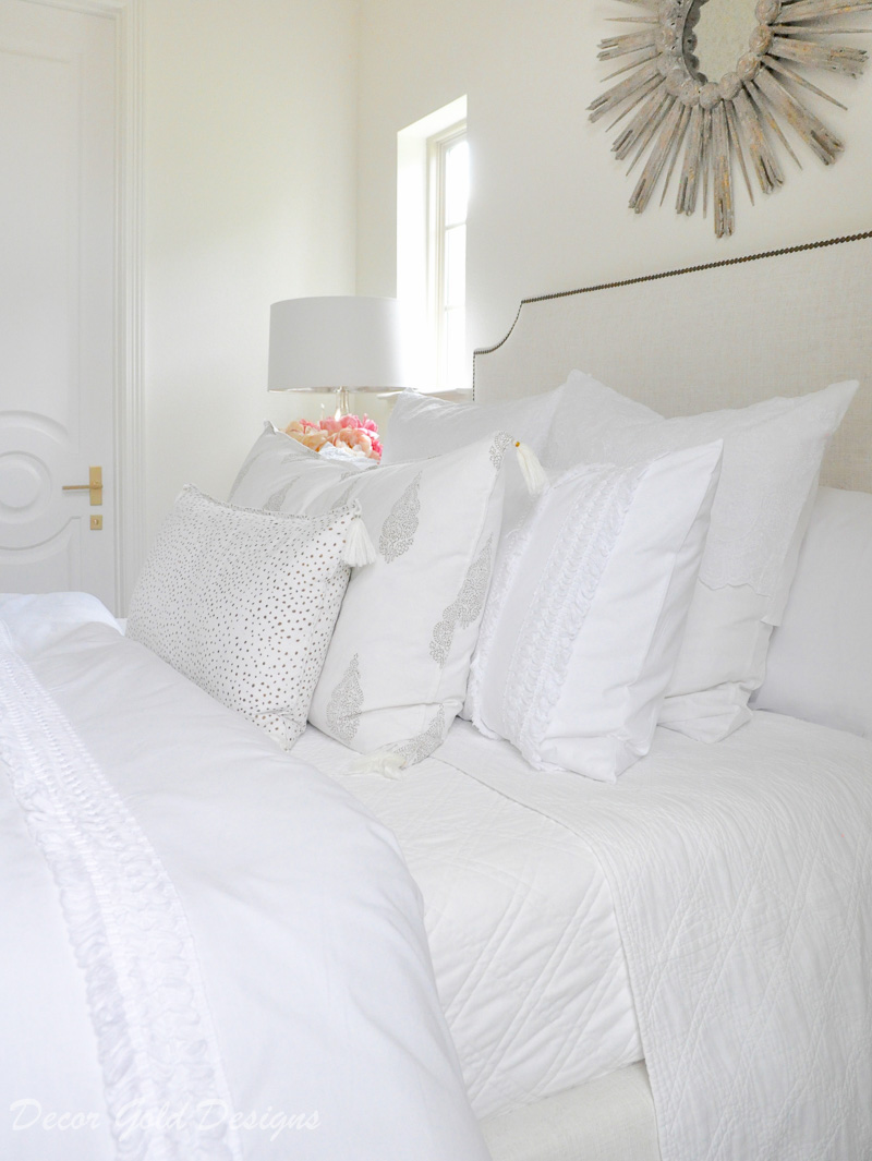 Beautiful designer bedroom white layered bedding 