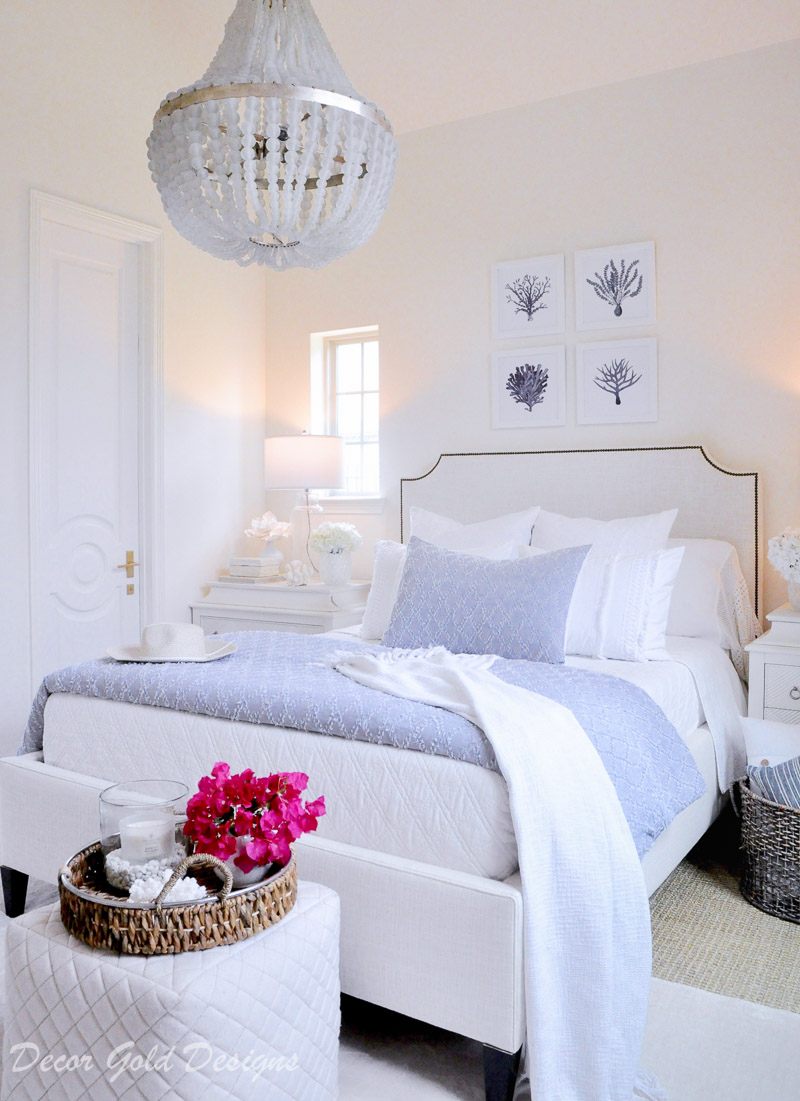 Coastal bedroom with whites soft blues