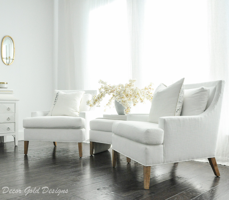 Master bedroom refresh white chairs ottoman