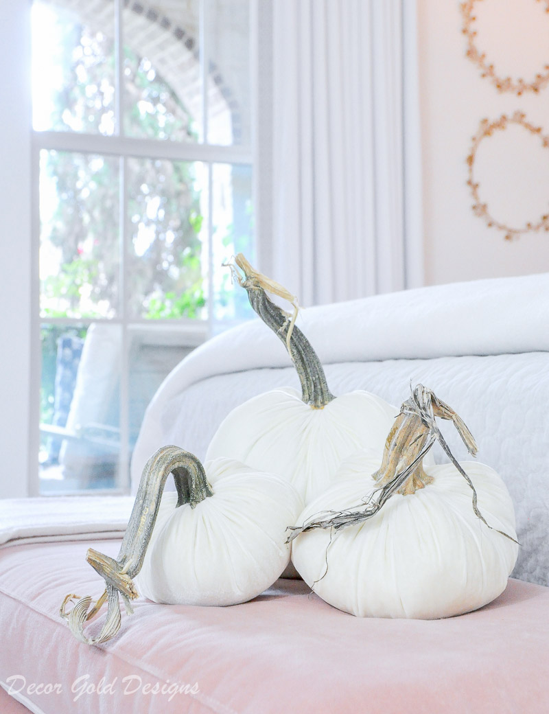 Subtle fall bedroom white velvet pumpkin decor