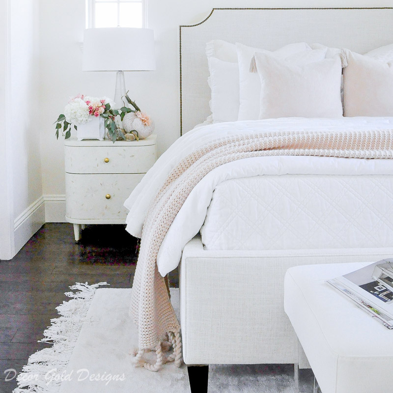 Subtle fall bedroom white bed blush accents