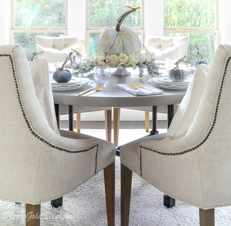 Elegant round tabletop pumpkin centerpiece styling