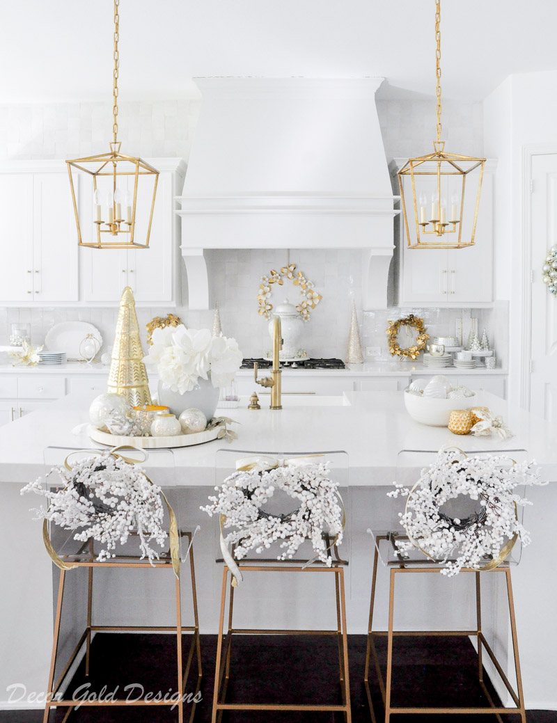 Bright cheerful Christmas kitchen decorated white berry wreaths