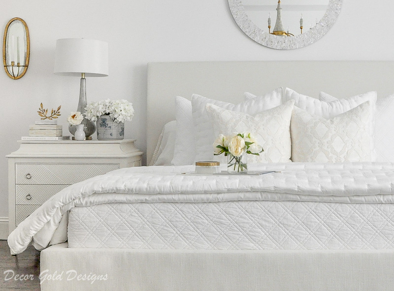 master bedroom white gold accents