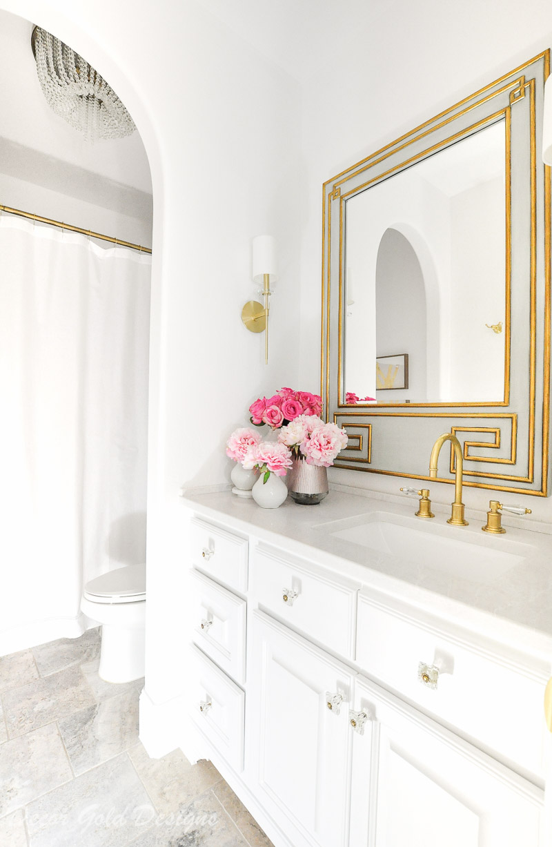 Powder bath beautiful white walls vanity brass accents