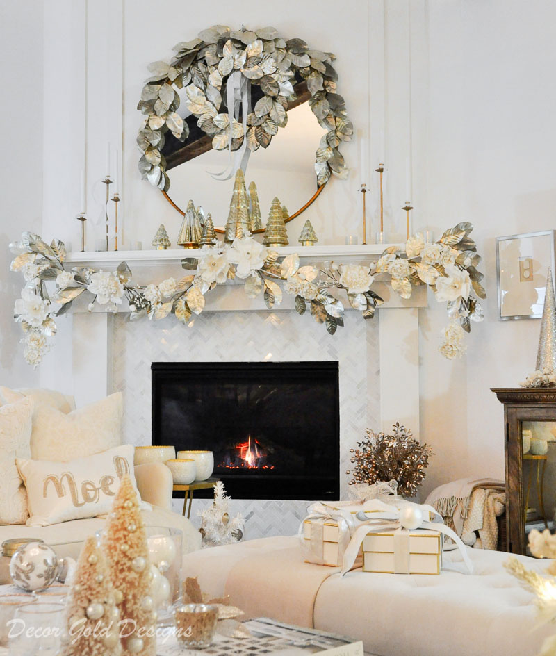 Decorated Christmas living room white gold mantel