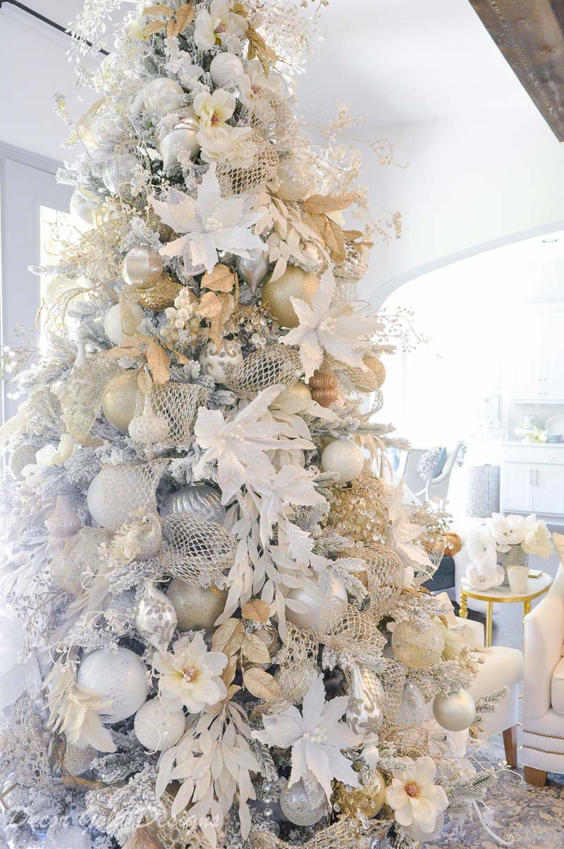 Decorated Christmas living room beautiful white flocked tree