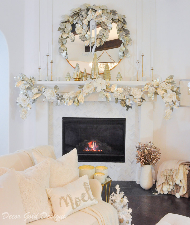 Decorated Christmas living room white gold mantel