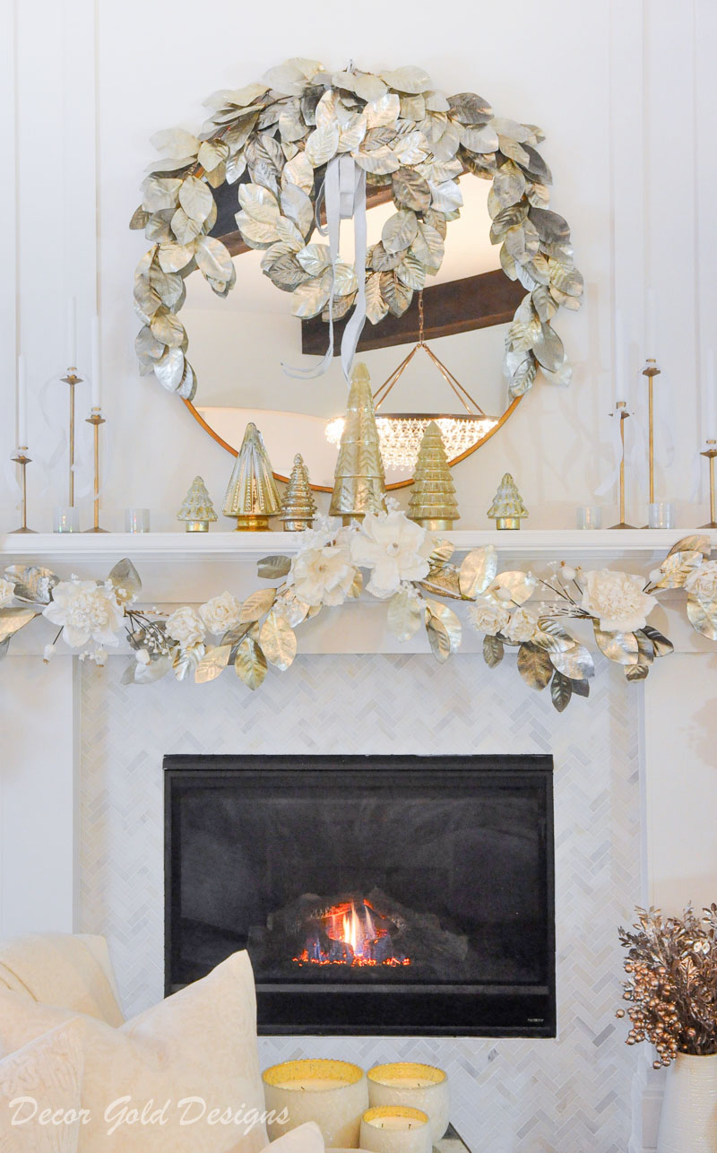 Decorated Christmas living room white gold mantel