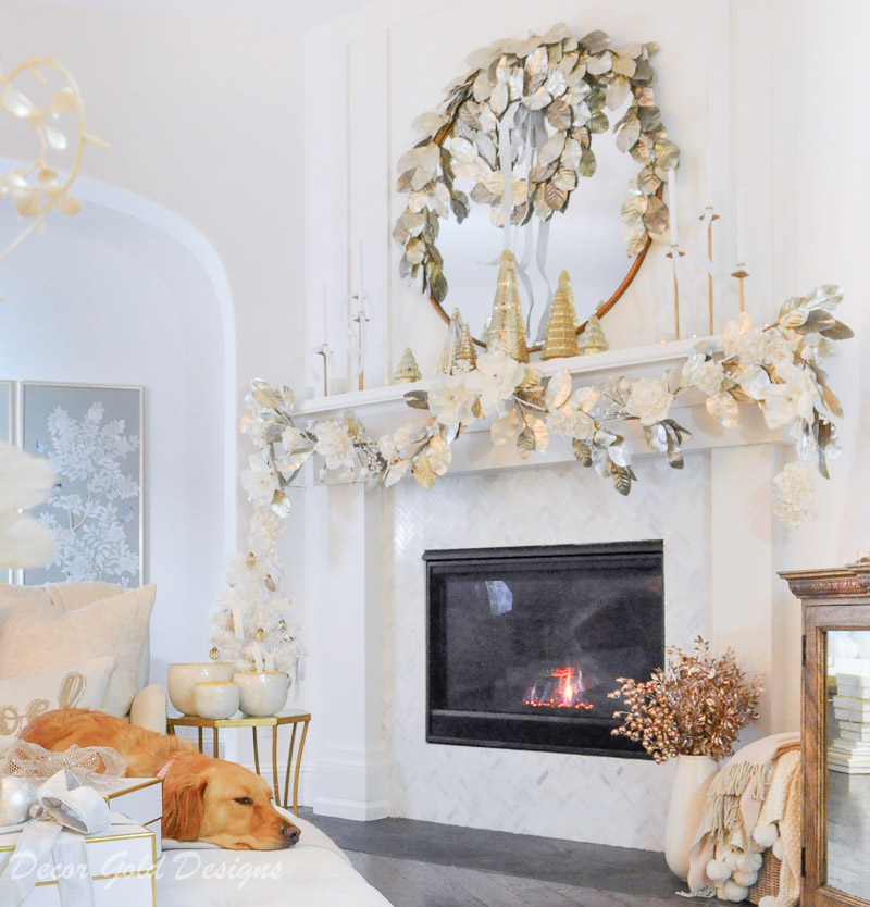 Decorated Christmas living room white gold mantel