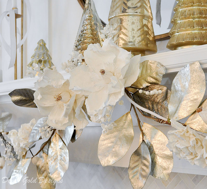 White Christmas living room gold garland mantel