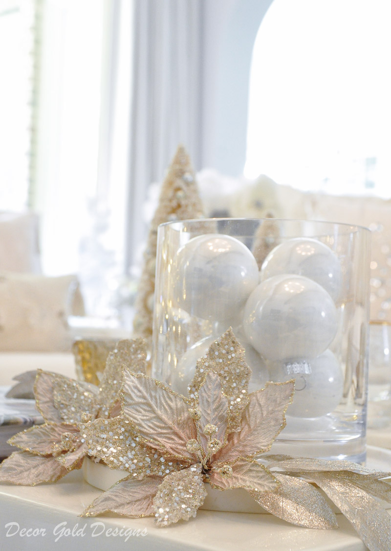 White ornaments hurricane Christmas living room decor 