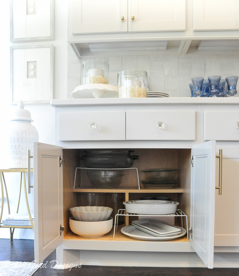 Kitchen organization project lower cabinet containing serving baking dishes