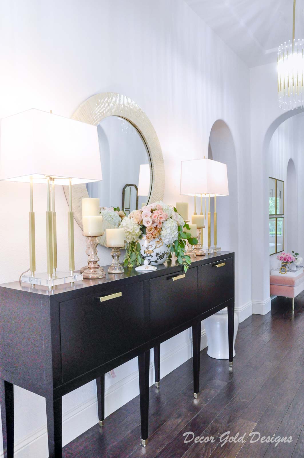 Entryway furniture, beautiful round mirror, elegant lamps