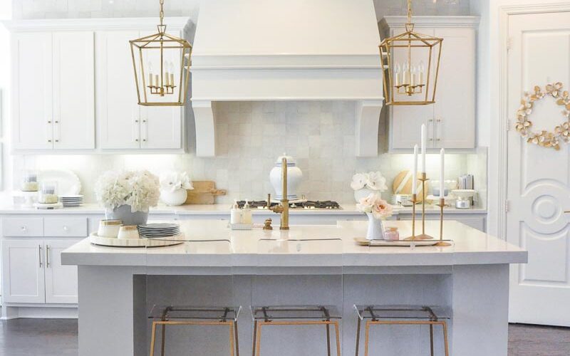 Winter white kitchen gold accents dining stools