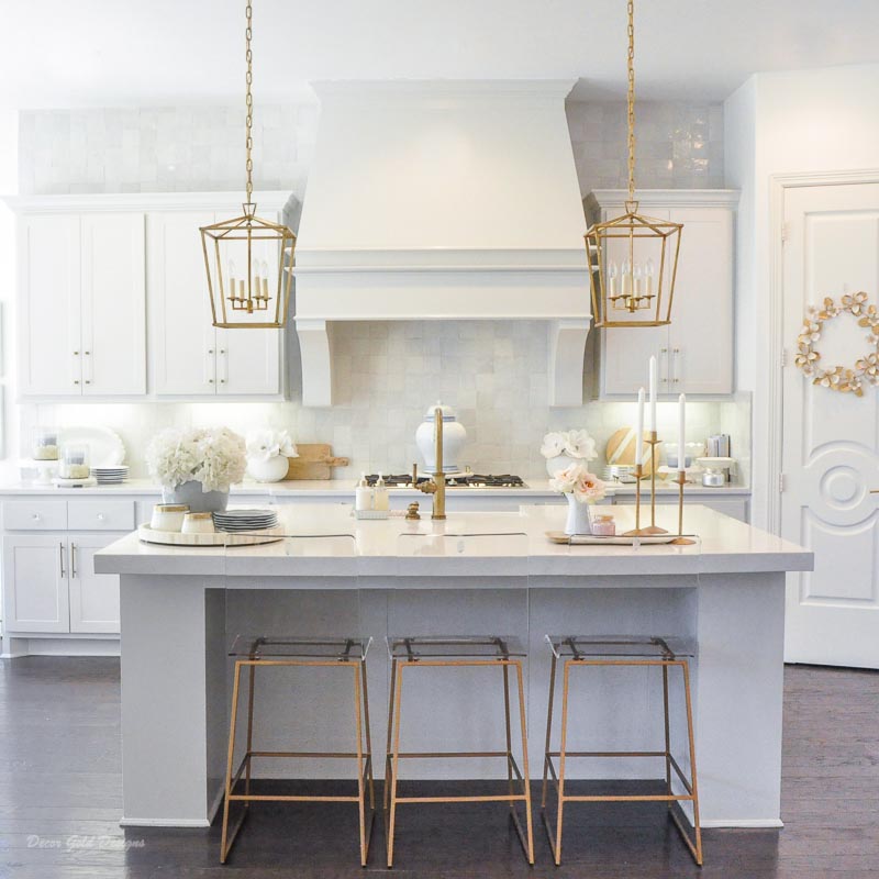 Winter white kitchen gold accents dining stools