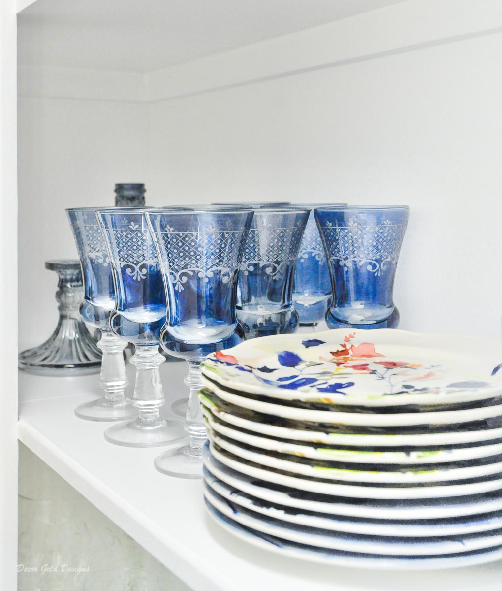 Entertaining closet blue glassware floral plates