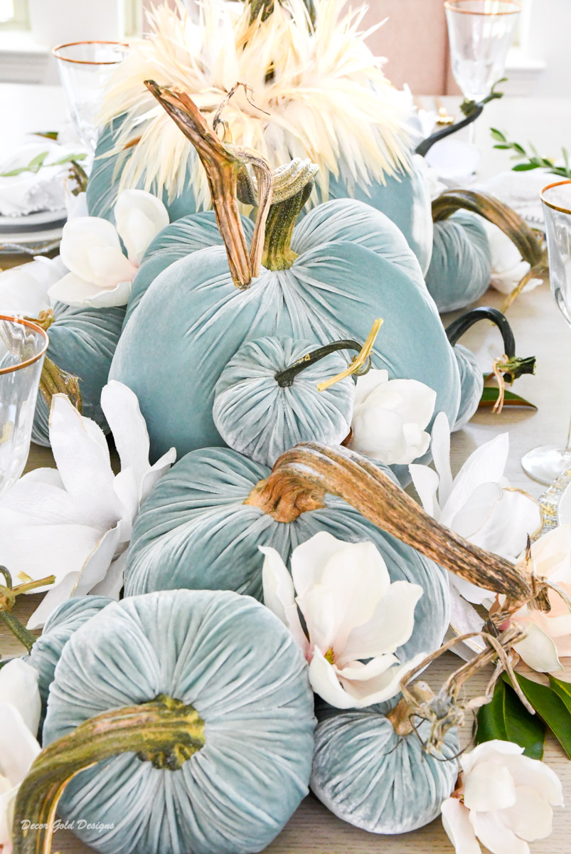 Elegant blue velvet pumpkin centerpiece magnolia flowers