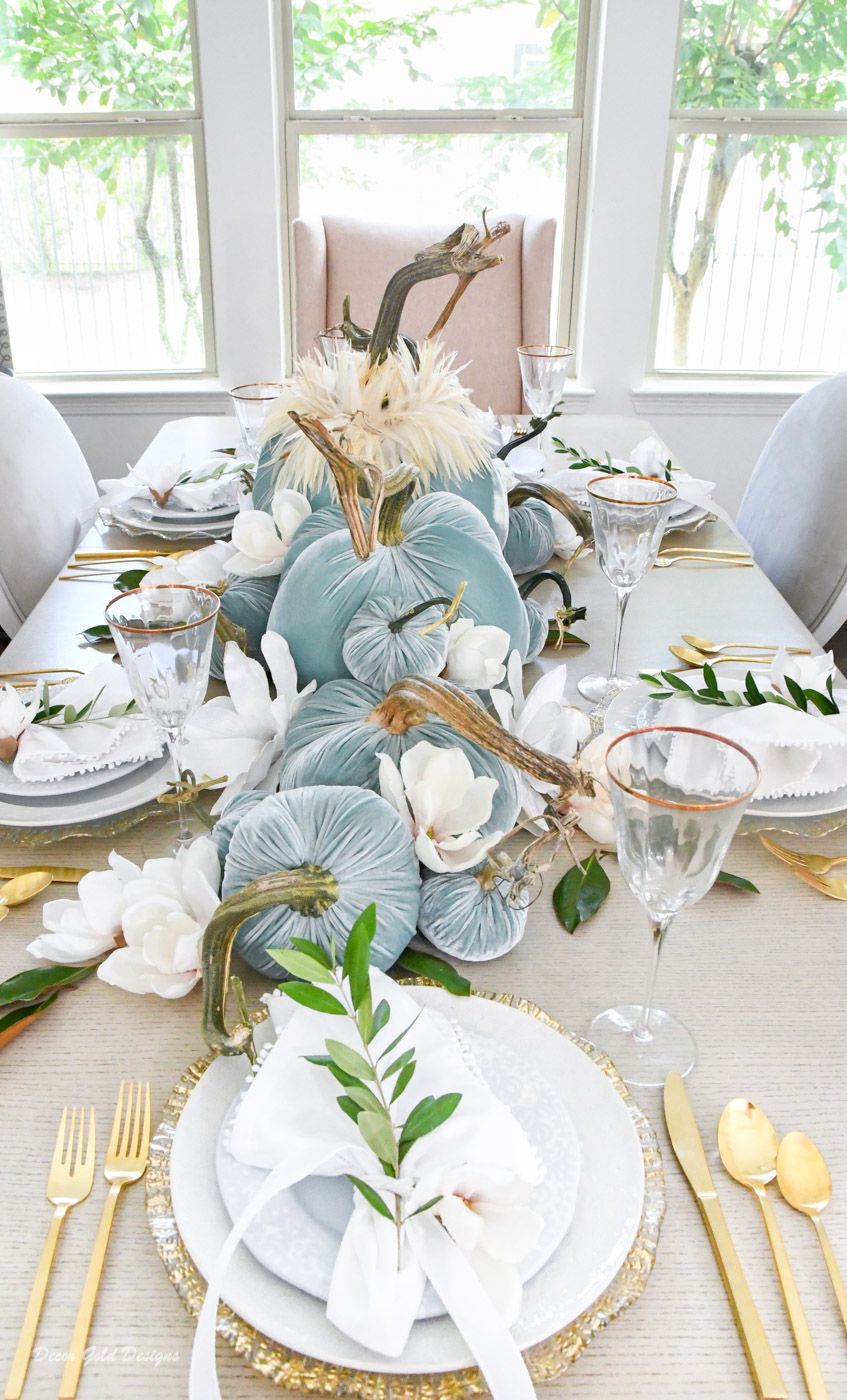 Elegant velvet pumpkin centerpiece blue magnolias