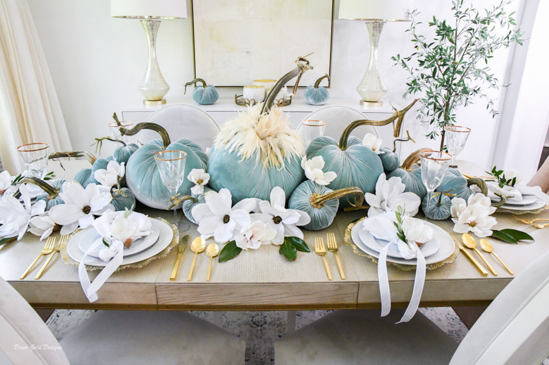 Elegant fall pumpkin centerpiece blue white magnolias