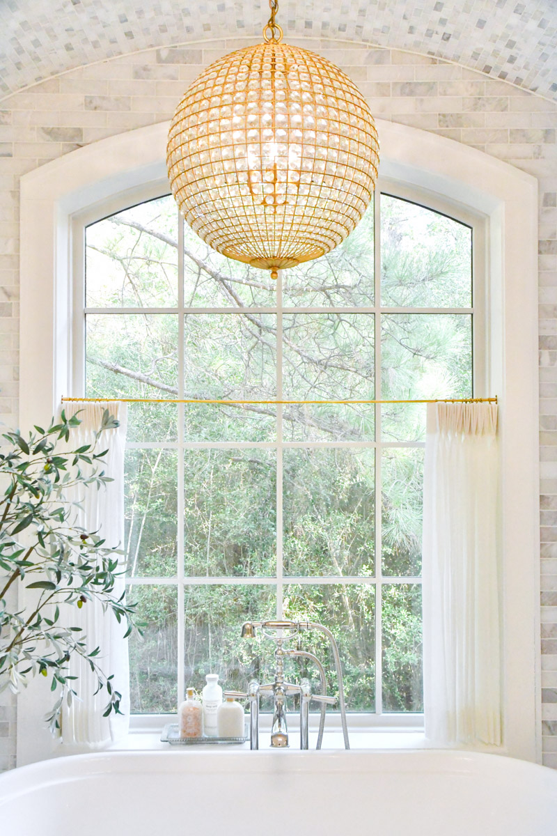 new home primary bathroom arched window